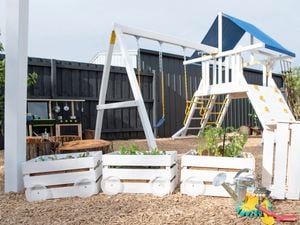 Timber benches are styled as a train 