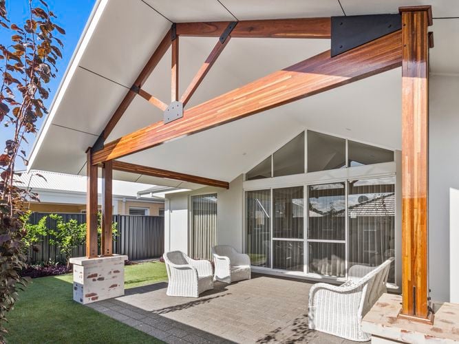 Patio
  framed by Spotted Gum posts.