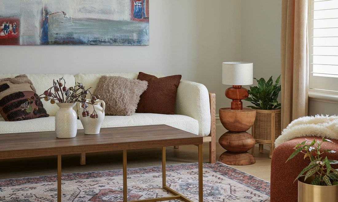 A lounge room with a white couch