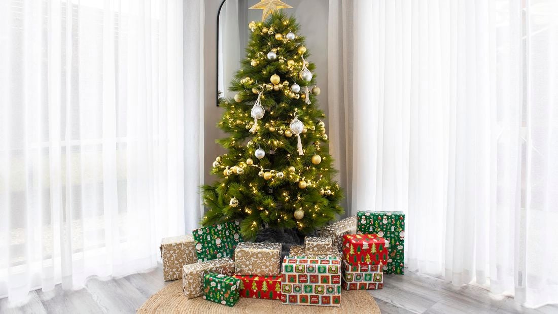 Christmas tree with presents underneath.