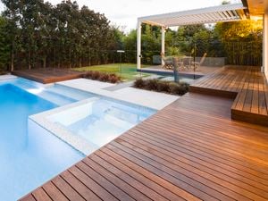 Outdoor pool, sitting area and trees
