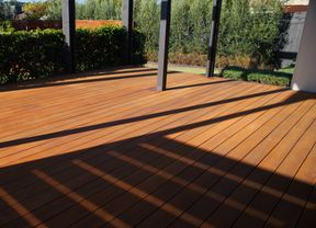 This image showcases the completed result of sanding a timber deck.