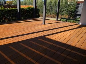 This image showcases the completed result of sanding a timber deck.
