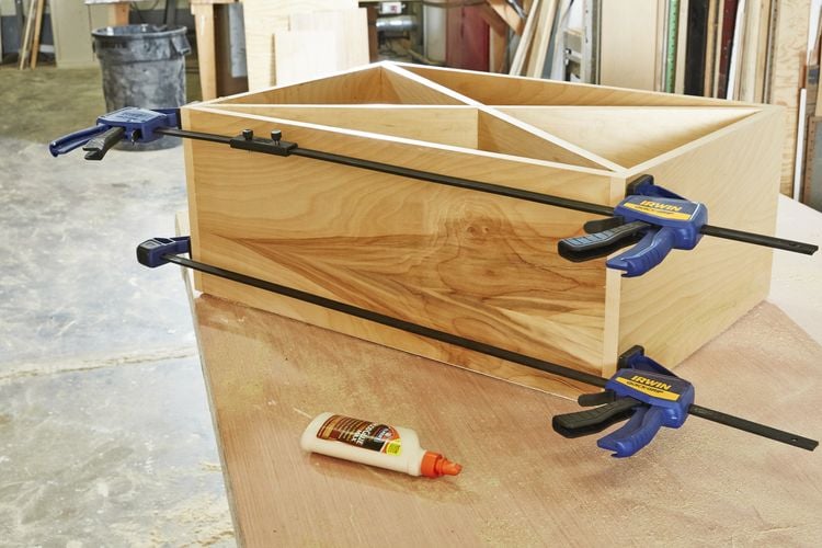 Timber box held together with clamps