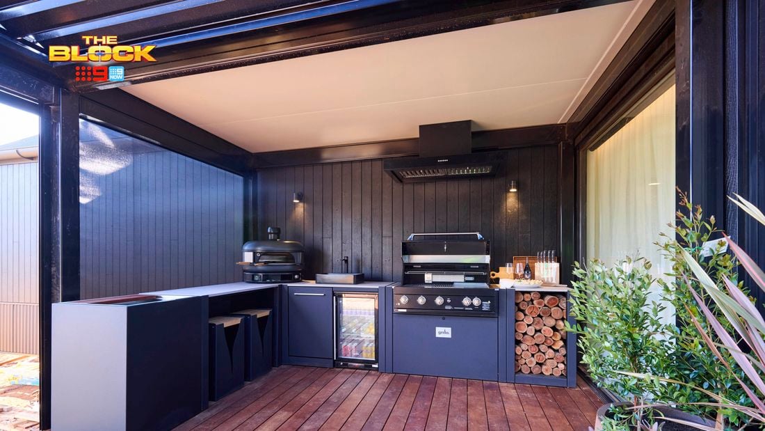 Outdoor area with a Barbecue and kitchen in it on decking.