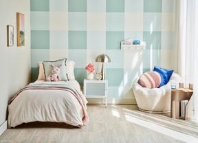 Nicely painted kid's bedroom.