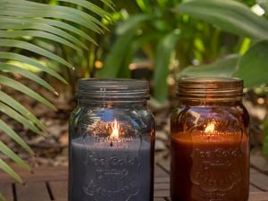 Citronella candles burning outdoors