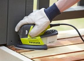 Sanding a wooden deck