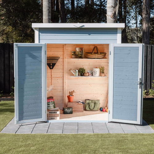 Contemporary light blue storage shed with wide double doors open to reveal organised garden tools, shelving, and storage space inside.