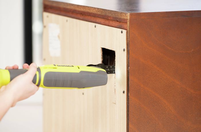 Multitool is used for cutting, sanding and trimming in D.I.Y. projects.