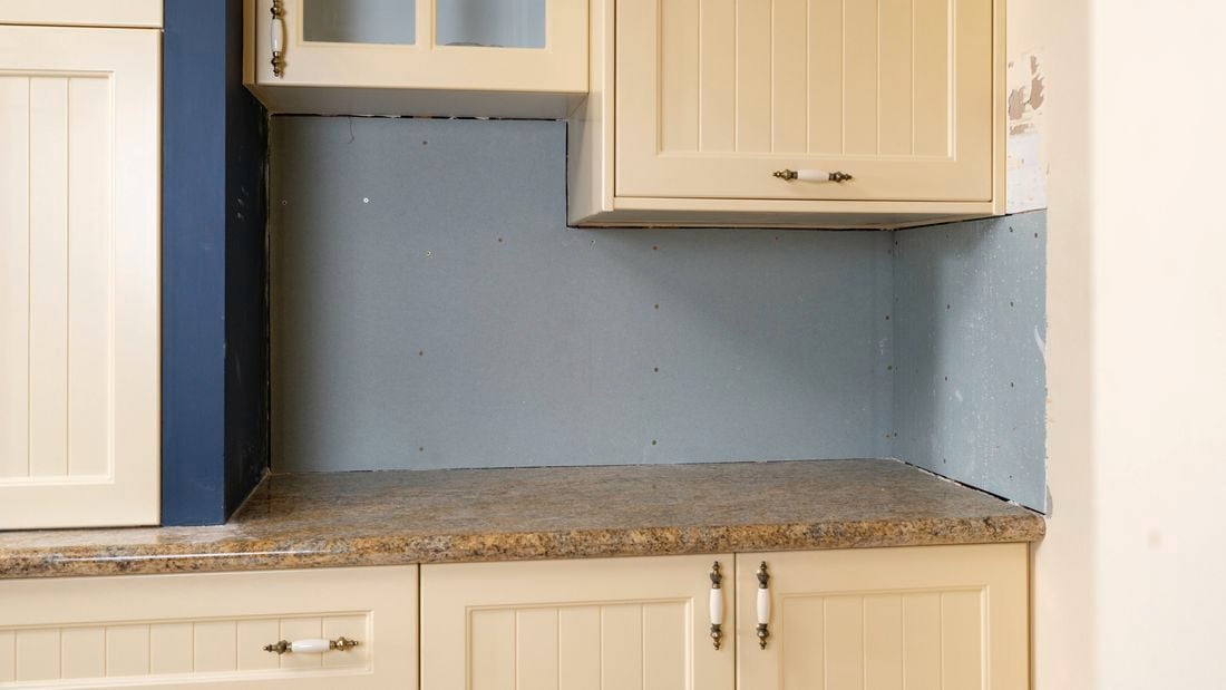Clean wall after tile removal