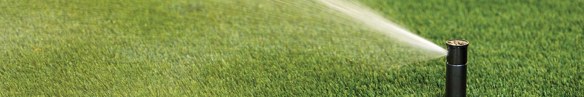 Sprinkler with water spraying out.