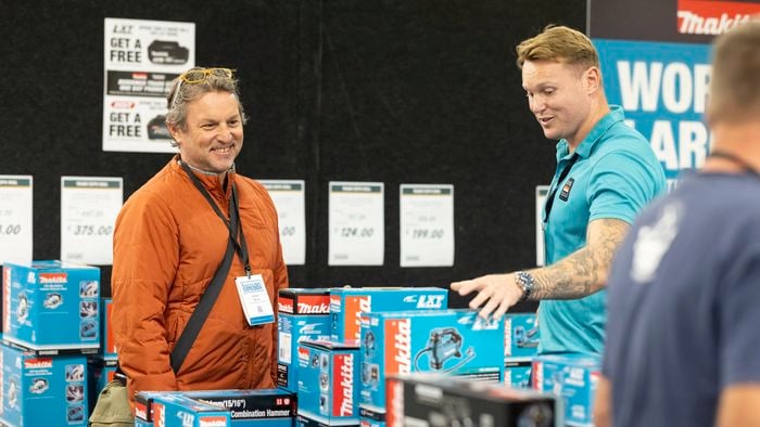 Customer shopping at NZ trade expo for Makita tools