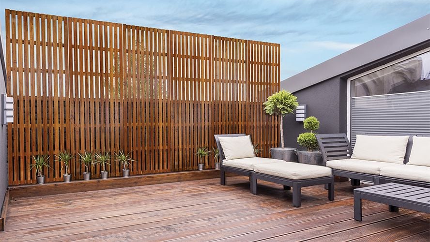 Timber lattice fence around a deck