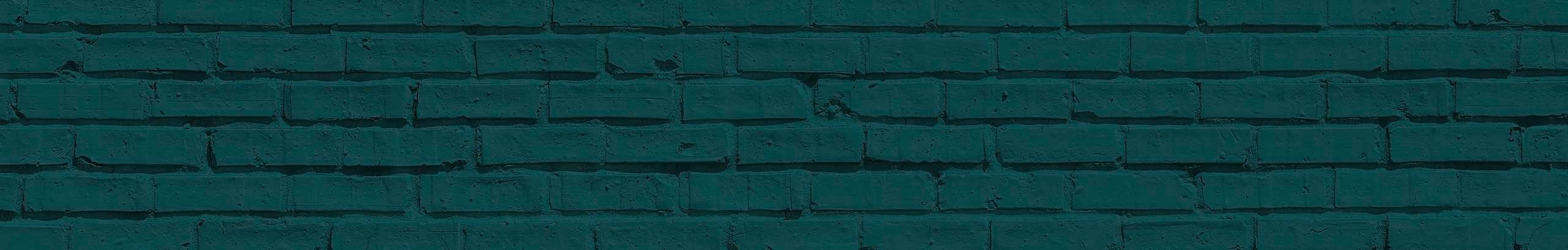 Dark green brick wall