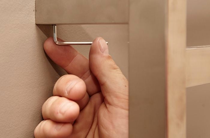 DIY Step Image - How to install a towel rail into plaster . Blob storage upload.