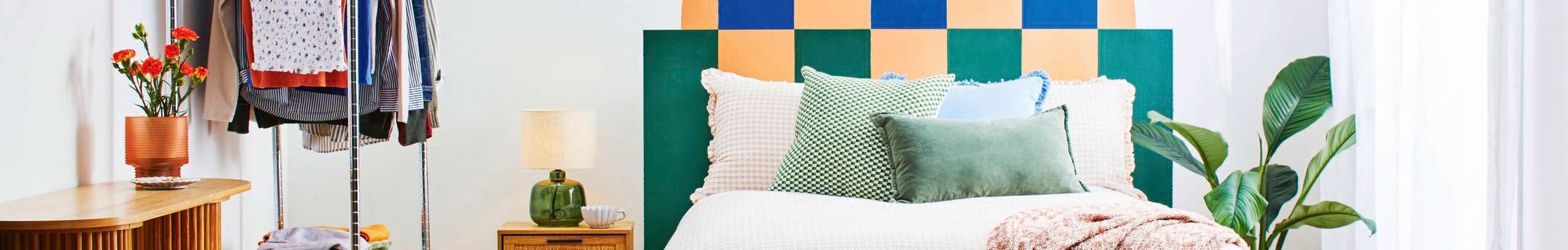 Brightly styled bedroom.