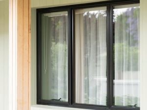 A clean glass window with black frame