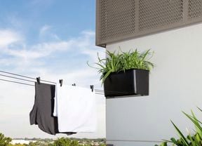Clothes hanging on a pull-out clothesline