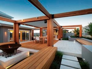 Timber decking and outdoor structures in an outdoor entertaining space.