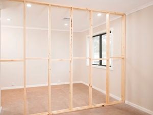 An image of a wooden stud wall frame