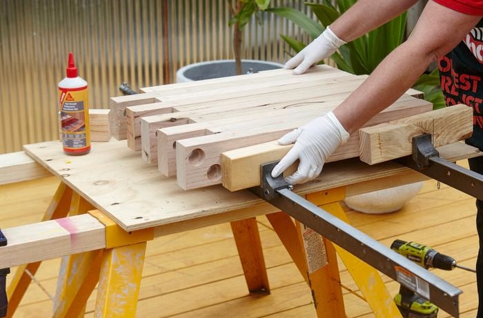 DIY Step Image - Learn how to build an outdoor garden bench . Blob storage upload.