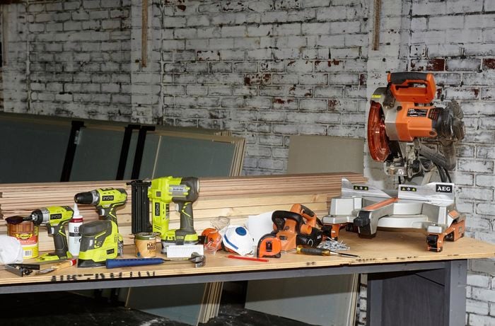 Various tools and materials needed to make a modern timber bedhead.