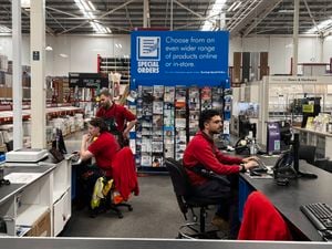 Team members sitting at Special Orders desk 