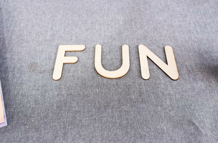 Wooden F U N letters.
