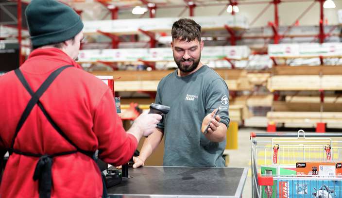 bunnings tm serving a customer in store