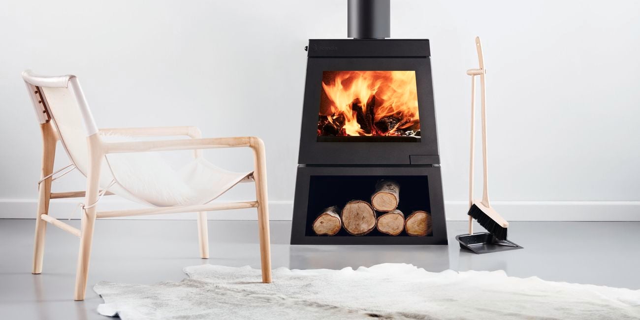 The beautifully crafted Scandia ‘Edge 50’ radiant heater featuring the wood storage pedestal addon.