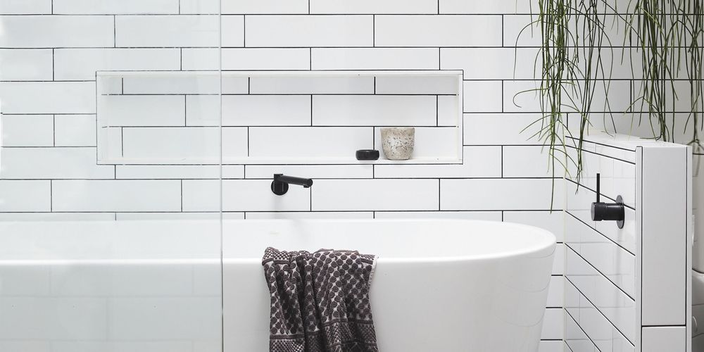modern tiled bathroom with a bathroom tub