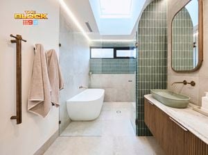 Green and white coloured bathroom with a timber fluted profile vanity and marble benchtop and bath