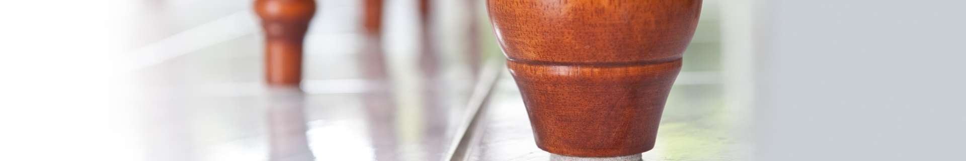 Close-up of base of table leg with scratch-proof adhesive attached