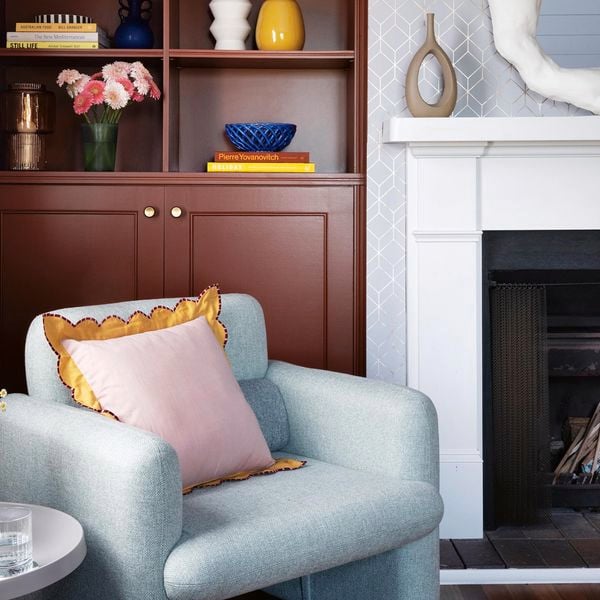 Living room with mirror and chair design