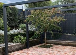 This winning landscape is full of great small garden ideas, designed to create the illusion of more space
