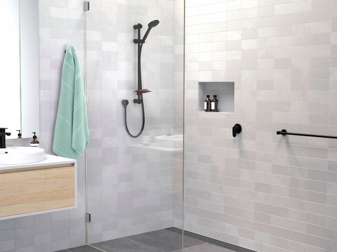 Matte black flexispray shower head with green towel