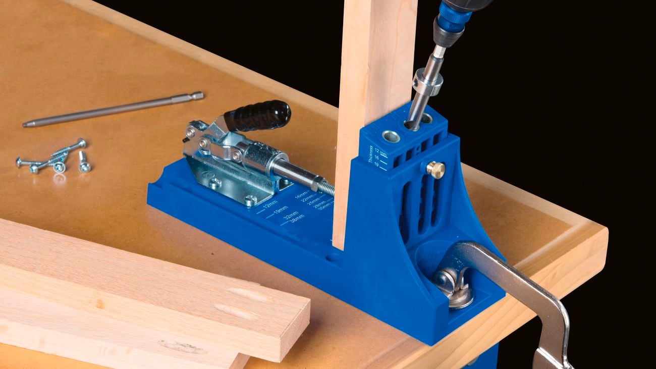 A person using a K4 jig pocket-hole system