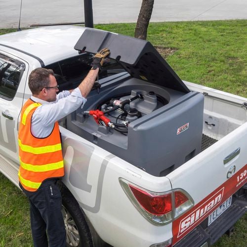 Small Selecta pump and tank on back of a ute