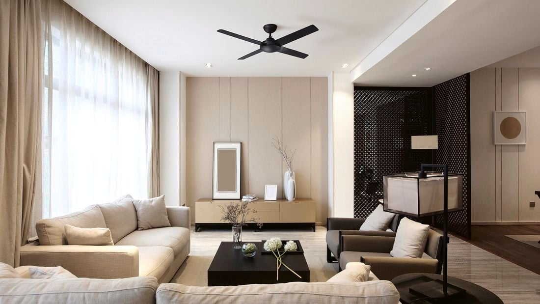 Contemporary living area in white and beige with black ceiling fan