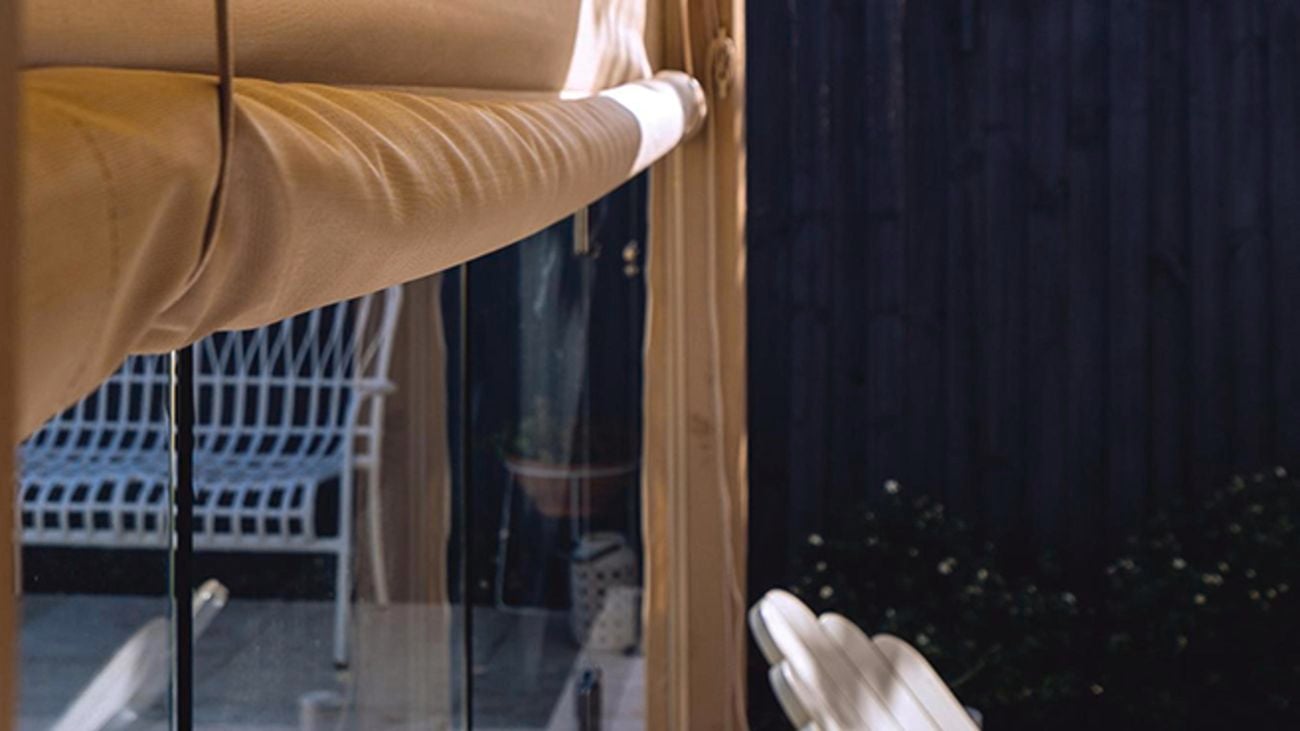 Close up of stone coloured bistro blinds