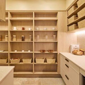 Butler’s pantry from The Block with open shelving, storage baskets, and a coffee station.