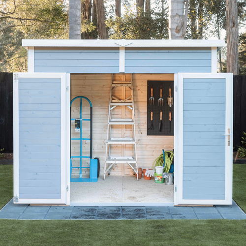 Large light blue storage shed with wide-opening double doors displaying a ladder, gardening tools, hose, and storage equipment inside.