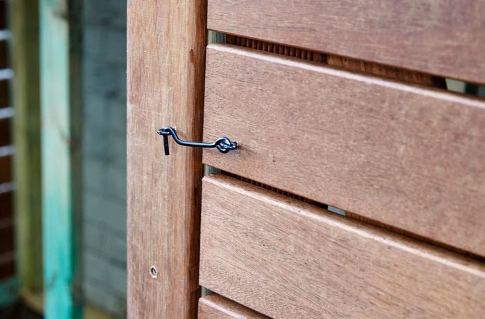 Timber bin unit with a latch.