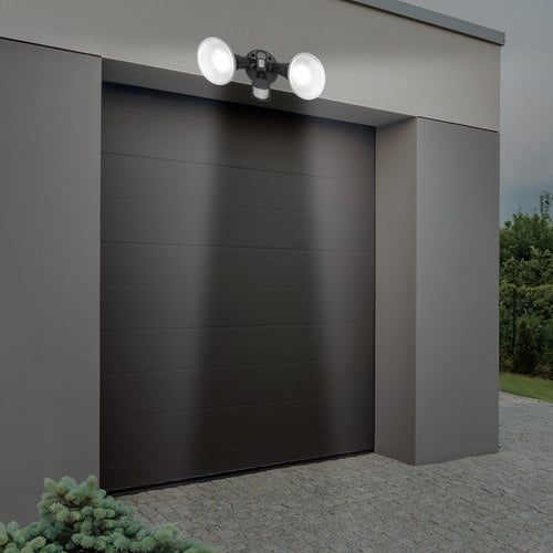 Outdoor lights over a garage door