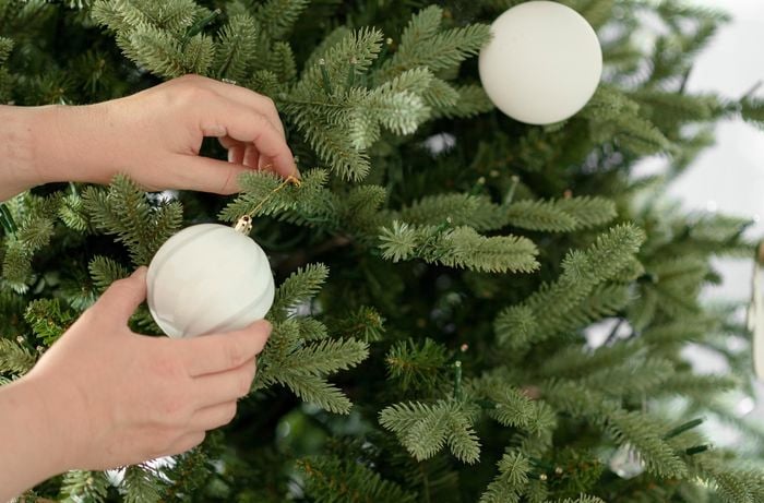 decorations being done on tree