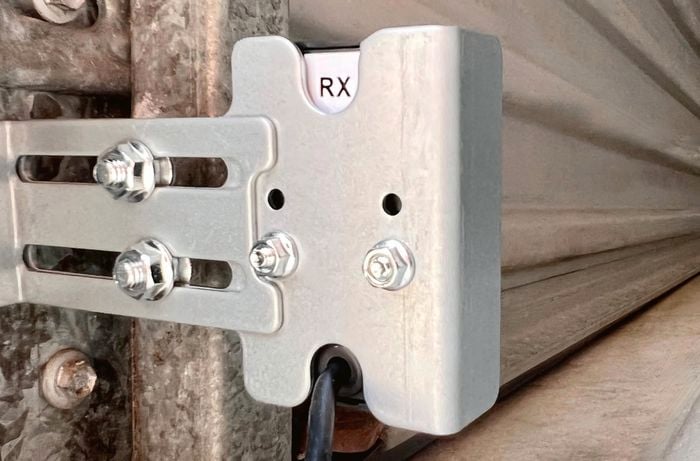 Mounting bracket on side of door.