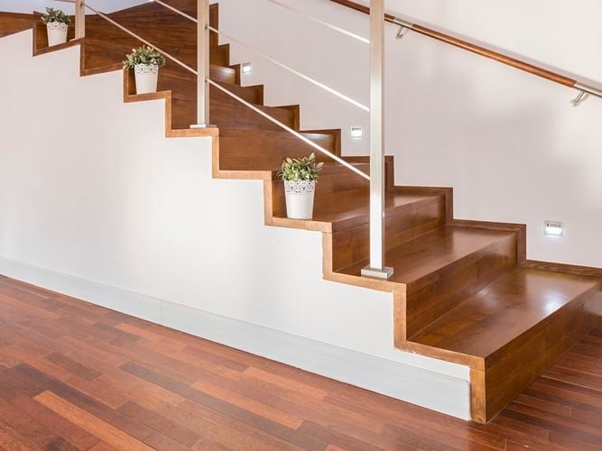 Timber staircase with white rails
